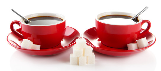 Red cups of strong coffee and sugar isolated on white