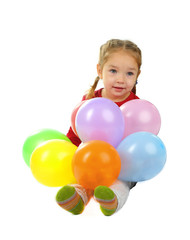Fototapeta na wymiar Little girl with colorful balloons isolated on white
