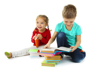 Little children with books isolated on white