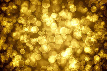 Golden glowing bokeh holiday background