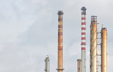 Many petrochemical plant pipes.