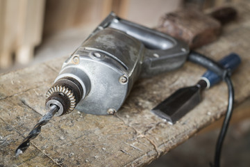 electric drill with carpenter tool