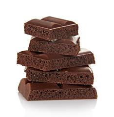 Slices of black chocolate are put by hill