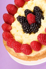 Custard tart with raspberries and blackberries
