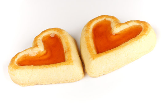 Two heart shaped apricot jam biscuits