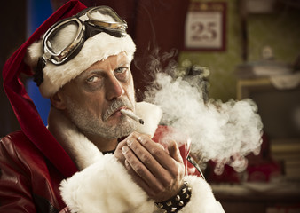 Bad Santa smoking a joint © stokkete