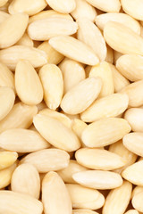 Peeled sweet almonds background