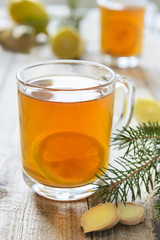 Mug with lemon and ginger tea