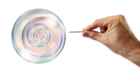 Bubbles inside of a Bubble about to explode by a needle 