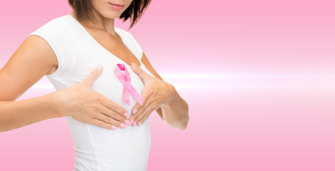 woman with pink cancer awareness ribbon