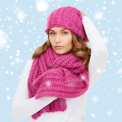 woman in pink hat and scarf