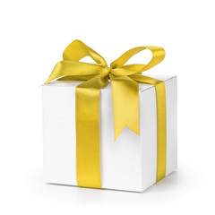 paper gift box wrapped with yellow ribbon