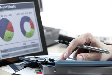 workplace with paper and electronic documents