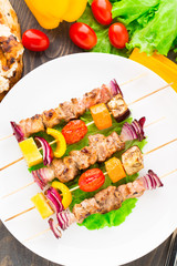 Barbecued pork and vegetable kebabs