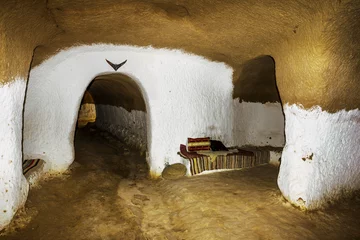 Muurstickers Underground House of trogladites in the desert of Tunisia,Matmat © toshket