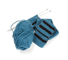 striped scarf on knitting needles