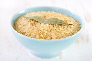 dry rice in blue bowl
