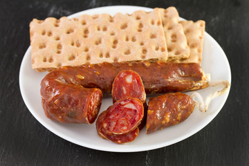sausages with toasts on plate