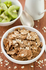 flakes in bowl and fruits