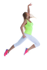 Studio shot of graceful young girl posing in jump