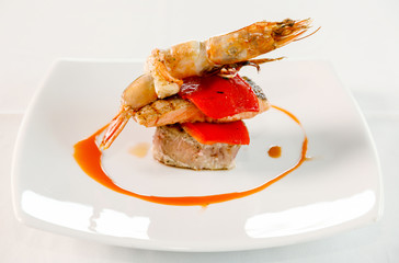 Prawns and fish grilled with chilli and herb.