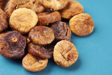 Dried figs on blue plate
