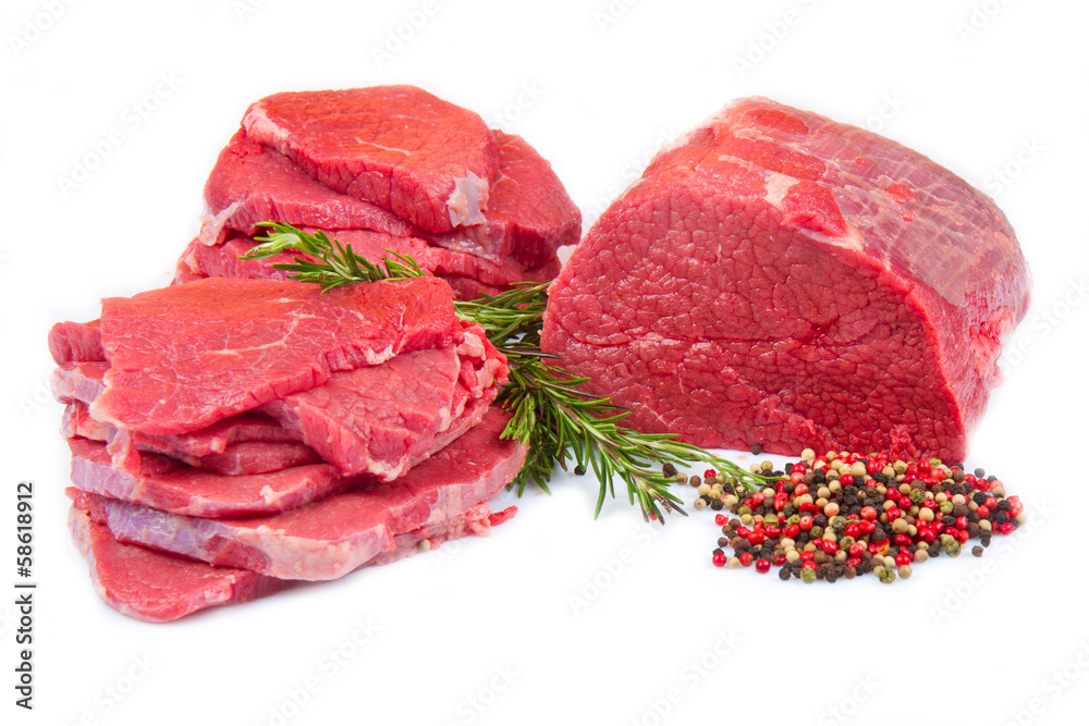 Wall mural huge red meat chunk and steak isolated over white background