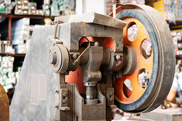 wheel and gears, detail of an old paper guillotine