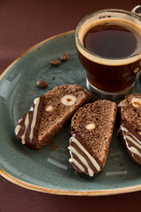 Chocolate biscotti with a mocha and nuts.
