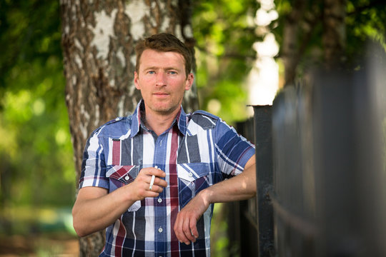 Man smoking outdoor (picture about smoking)