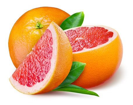 Grapefruit with a half and leaves on white background