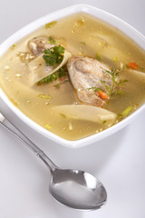 homemade chicken soup with pasta and vegetables