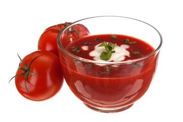 delicious homemade tomato soup with cream and basil