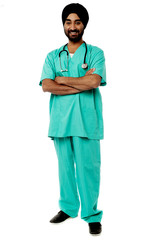 Friendly male doctor, full length portrait.