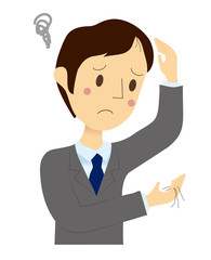 抜け毛を気にする男性