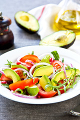 Avocado with Pomegranate and Rocket salad