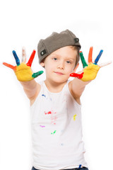 boy with hands in paint on white