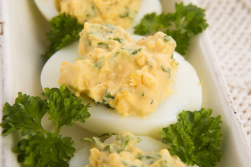 Stuffed eggs with parsley and mayonnaise