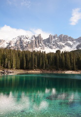 turquoise lake Carezza and the Italian alps Dolomites, Northern Italy