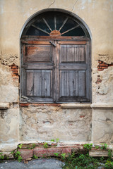 Old wooden arc window