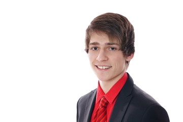 Portrait of young smiling businessman at suit