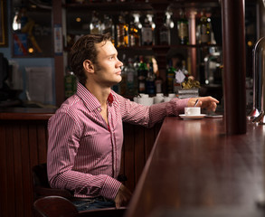 man with a cup of coffee
