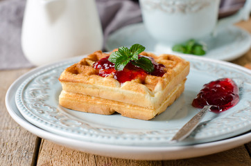 Waffles with jam for breakfast