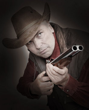 Man with shotgun.