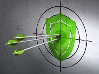 Privacy concept: arrows in Shield target on wall background