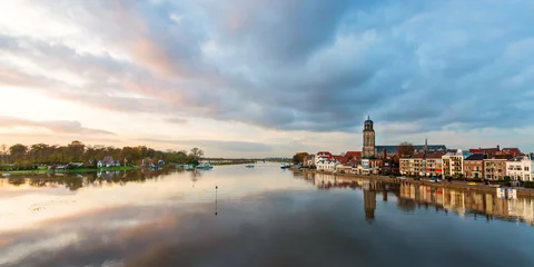 Fotobehang Panoramic river view of the Dutch historic city Deventer © Martin Bergsma