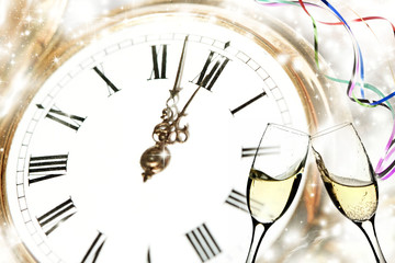 Glasses of champagne against holiday lights