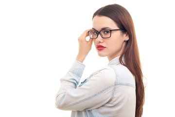 Young girl in glasses on white background