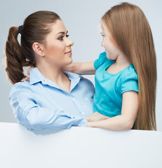 Business woman with kid girl isolated portrait behind white boa