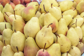 Yellow pears at a farmers market.